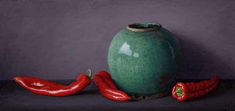 Red peppers with green jug
